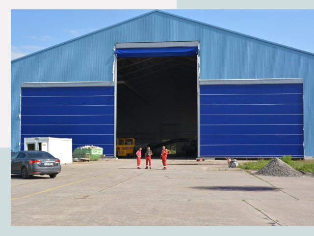 Ангарные ворота в Хабаровск от СтальСтрой-Хбр по цене 617 руб.